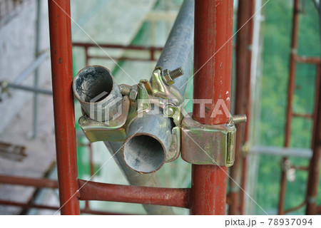 SELANGOR, MALAYSIA -NOVEMBER 10, 2016: Scaffolding connector detail at the construction site. The connector bind or tie scaffolding or safety pipe together.  78937094