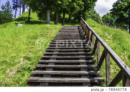 A Wooden Staircase Leads to the top of a High Mound A Wooden Staircase Leads to the top of a High Mound 78940778