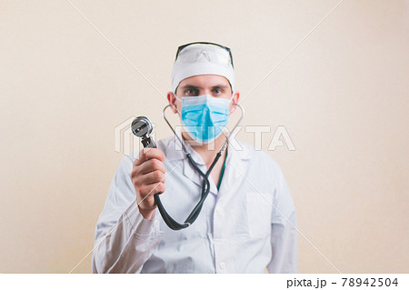 Young doctor portrait with stethoscope 78942504
