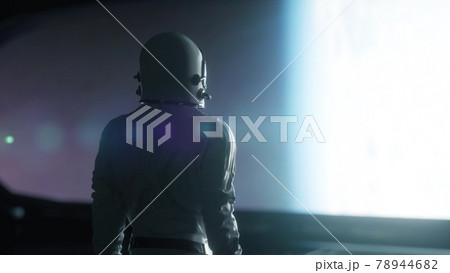 Alone astronaut looking at the huge illuminator of an unknown spaceship interior. 3d rendering 78944682