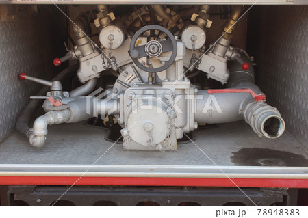 Close up on mechanics of a fire truck. Industrial, valves, mechanics. 78948383