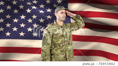 Composition of male soldier saluting over american flag Composition of male soldier saluting over american flag 78953982
