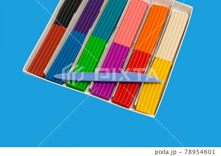 colorful plasticine sticks with a plastic knife colorful plasticine sticks with a plastic knife 78954601