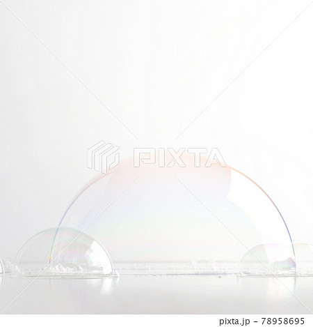 A hemisphere of a transparent soap bubble mockup for the presentation of cosmetics. White clean light background. 78958695