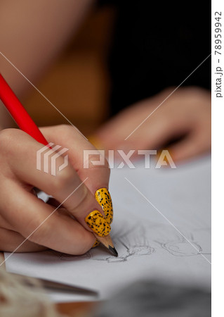 Fashion designer drawings with a pencil sketches 78959942