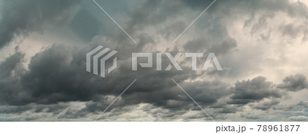 Panorama view of overcast sky. Dramatic gray sky and white clouds before rain in rainy season. Cloudy and moody sky. Storm sky. Cloudscape. Gloomy and moody background. Overcast clouds. 78961877