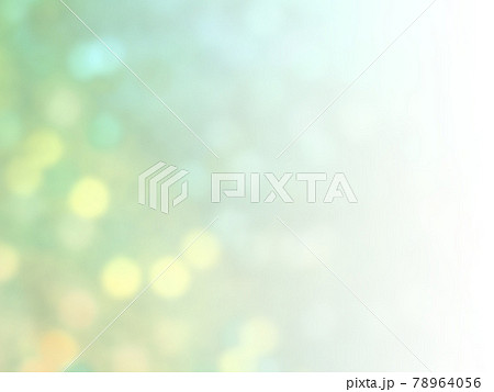 キラキラ輝くイルミネーション背景イメージ薄 黄緑系 左から右へ薄くなるグラデーション 横 他系色有りのイラスト素材