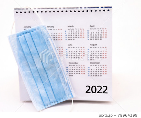 Medical mask and Desk Calendar 2022. Sanitary mask and calendar. 78964399