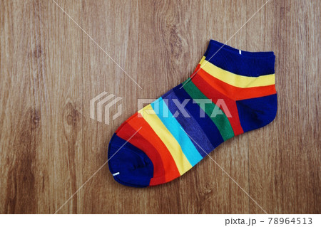 Top View of Colorful socks on wooden background 78964513
