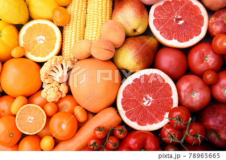 Fresh harvested yellow, red and orange fruits and vegetables from market: corn and orange, tomato and lemon, apple and pear, grapefruit and carrot 78965665