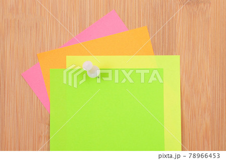 Colored Sticky Notes Pinned to the Wooden Message Board Colored Sticky Notes Pinned to the Wooden Message Board 78966453