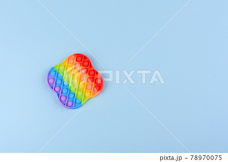 Bright colorful children's toy made of silicone designed to relieve stress Bright colorful children's toy made of silicone designed to relieve stress 78970075