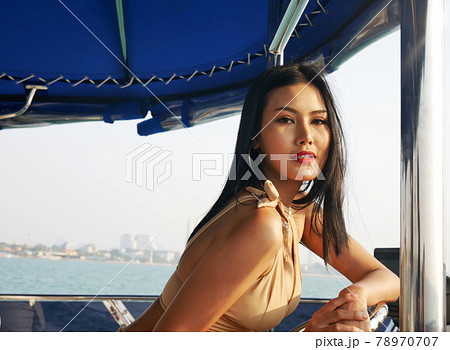 Beautiful Asia young woman sexy bikini traveling on boat in holiday weekend at Thailand. 78970707