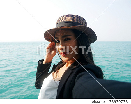 Beautiful Asia young woman sexy bikini traveling on boat in holiday weekend at Thailand. Beautiful Asia young woman sexy bikini traveling on boat in holiday weekend at Thailand. 78970778