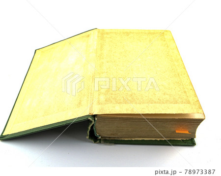 Old books on a white background. 78973387