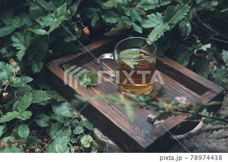 Mint tea on a wooden tray Mint tea on a wooden tray 78974438