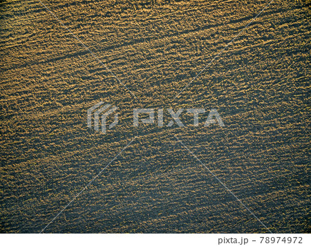 plowed field aerial view 78974972
