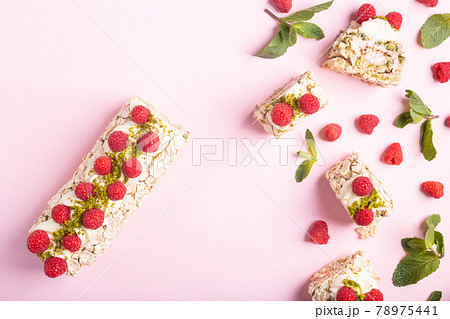 Dessert pistachio roll with raspberry filling. Food photo with space for text, concept of sweets 78975441