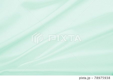 Smooth elegant green silk or satin luxury cloth texture as abstract background. Luxurious background design Smooth elegant green silk or satin luxury cloth texture as abstract background. Luxurious background design 78975938