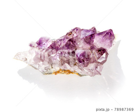 Amethyst gemstone on a white background Amethyst gemstone on a white background 78987369