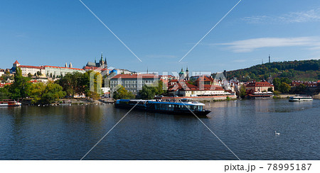 Pleasure boat on the Vltava pier in the fall. View of Prague. 78995187