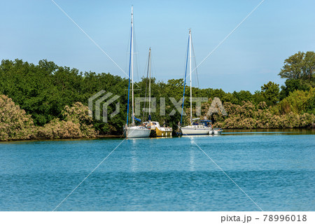 Sailing Boats Moored in Venetian Lagoon - Venice Veneto Italy 78996018