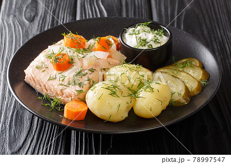 Kall inkokt lax from Sweden poached cold salmon with new potatoes closeup in the plate. horizontal 78997547
