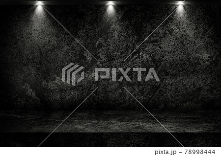 Studio dark room concrete floor grunge texture background with spot lighting effect. Studio dark room concrete floor grunge texture background with spot lighting effect. 78998444