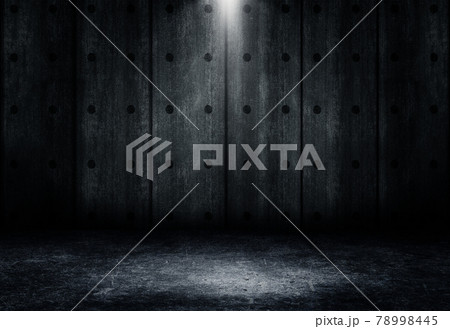 Studio dark room concrete floor grunge texture background with spot lighting effect. Studio dark room concrete floor grunge texture background with spot lighting effect. 78998445