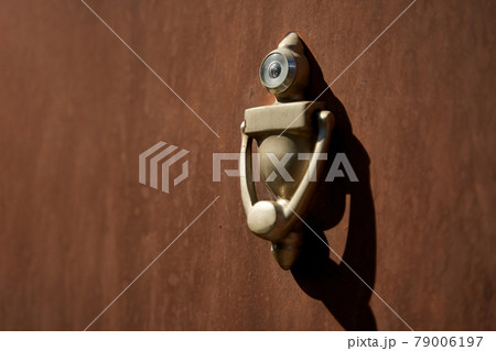 Unusual stylish door knocker in the shape of a robot Unusual stylish door knocker in the shape of a robot 79006197