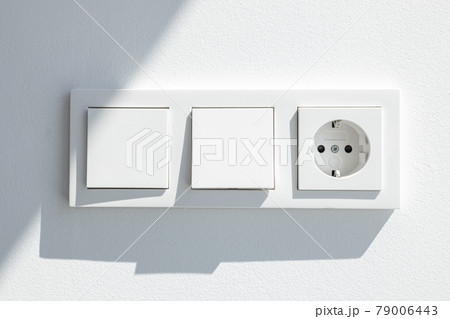 Modern White switch board with two switch and one european plug Modern White switch board with two switch and one european plug 79006443