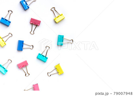 Colorful office paper clips on white background. 79007948