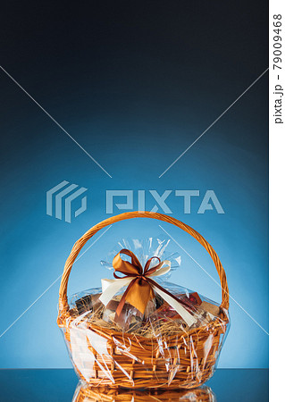 gift basket on blue background 79009468