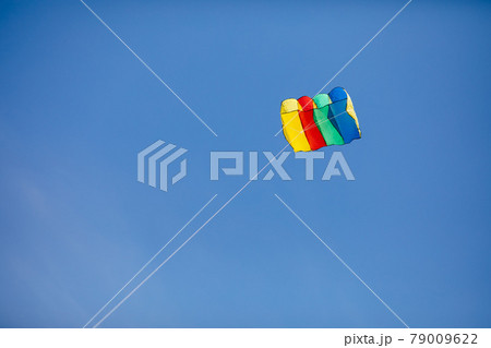 colorful kite on blue sky background 79009622