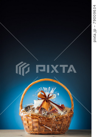 gift basket on blue background with copy-space gift basket on blue background with copy-space 79009634