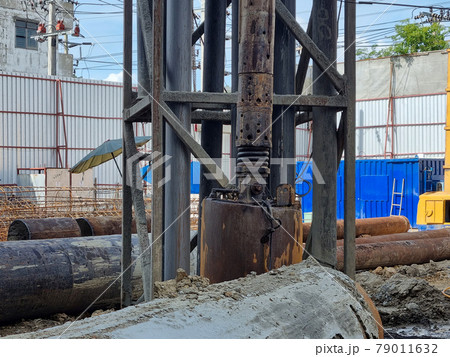 Cranes on the construction site area industry machine of drilling piles 79011632