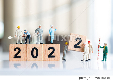 Miniature people : Worker team create wooden block number 2022 79016836