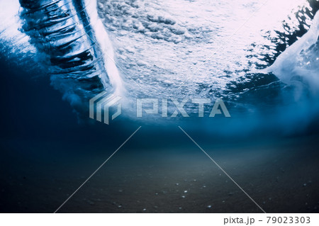 Ocean wave and vortex underwater with transparent water. Ocean wave and vortex underwater with transparent water. 79023303