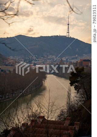 The Kura River flows through the city of Tbilisi. City landscape The Kura River flows through the city of Tbilisi. City landscape 79023511