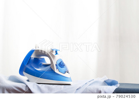 Blue irons are readily available at the laundry. Blue irons are readily available at the laundry. 79024530
