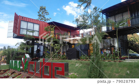 SERDANG, MALAYSIA -DECEMBER 03, 2016: A house designed from refurbish shipping container at Serdang, Malaysia. SERDANG, MALAYSIA -DECEMBER 03, 2016: A house designed from refurbish shipping container at Serdang, Malaysia. 79028793