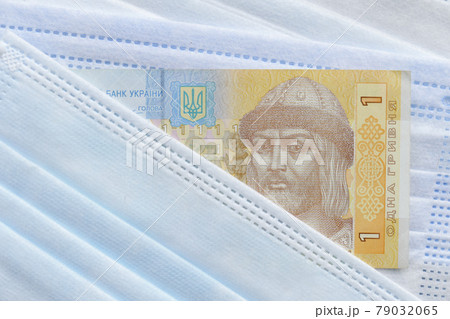Ukrainian banknote hryvnya on mask 79032065