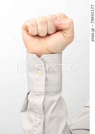 Male hand clenched in a fist on a white background 79042177