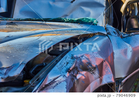 Front view of a dented car after an accident Front view of a dented car after an accident 79046909