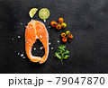 Fresh salmon fish fillet on wooden board 79047870