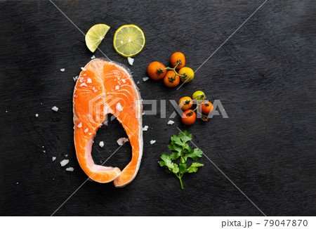 Fresh salmon fish fillet on wooden board 79047870