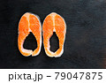 Fresh salmon fish fillet on wooden board 79047875