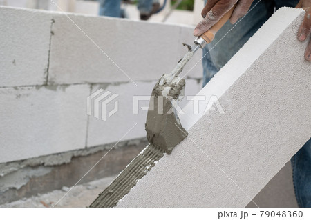 Bricklayer worker Bricklayer worker 79048360
