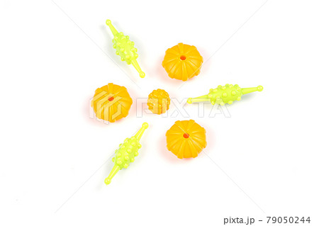 Close-up view of Multicolored plastic beads for a girl's bracelet 79050244
