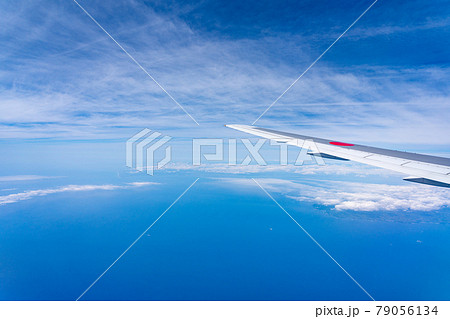 飛行機 飛行中 空撮 高所 旅行 観光 ゴールデンウィーク 空 雲 帰国 昼 午前 航空 飛行機 飛行中 空撮 高所 旅行 観光 ゴールデンウィーク 空 雲 帰国 昼 午前 航空 79056134